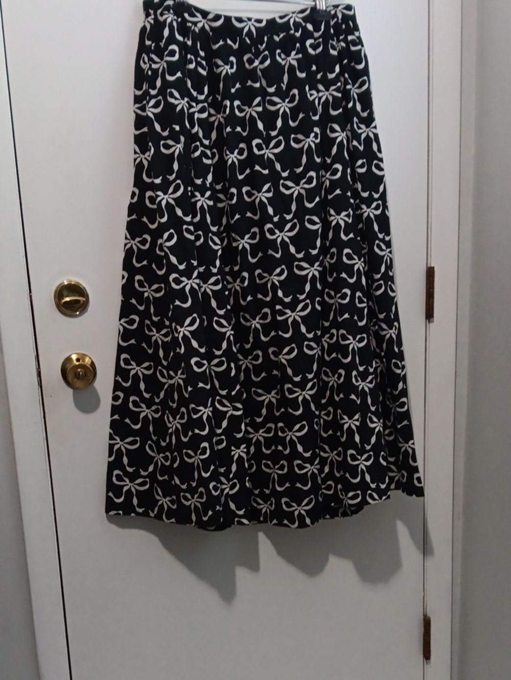 Maeve Black Midi Skirt with White Bow Pattern